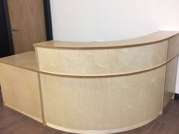 Curved birch ply reception desk