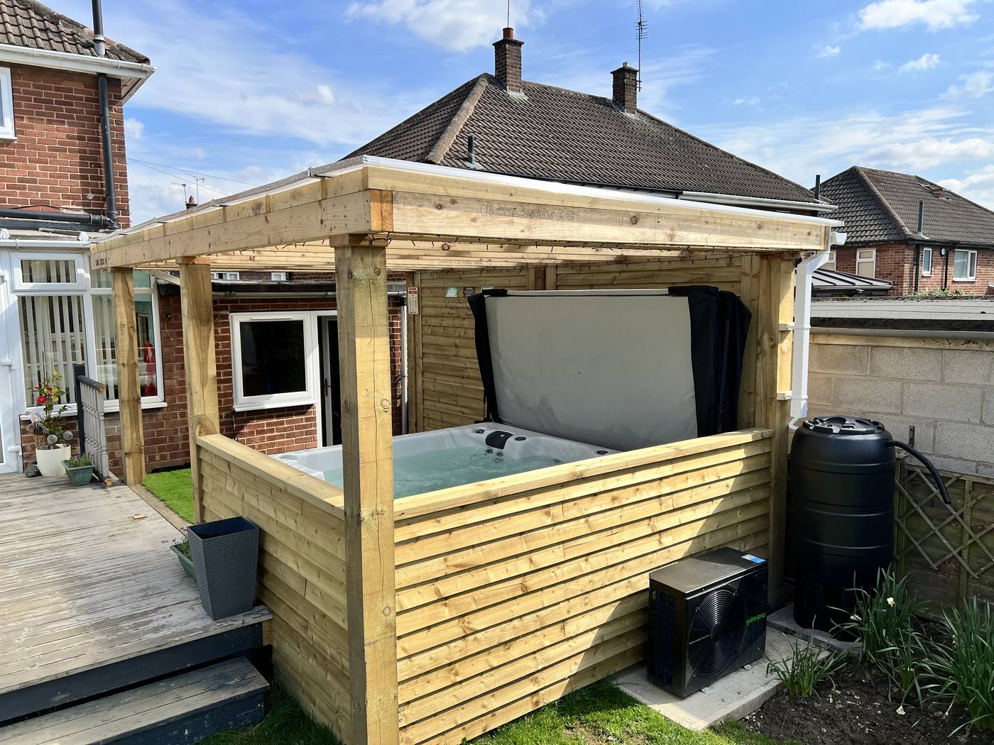 Timber-framed hot tub shelter