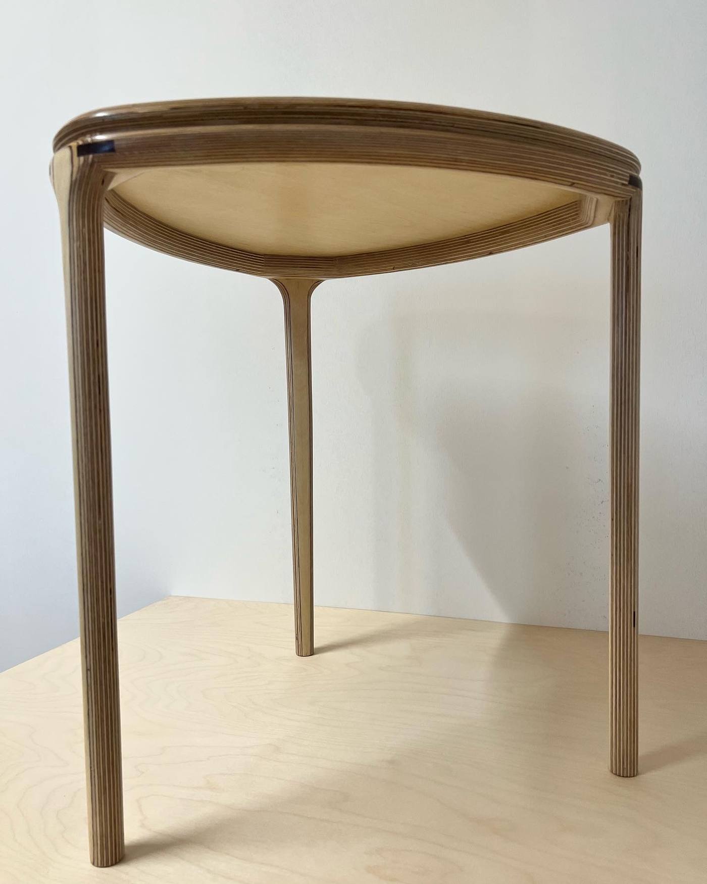 Underside of a round plywood table