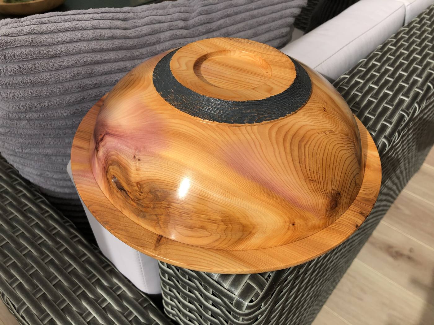 Turned yew bowl with dark rim inlay