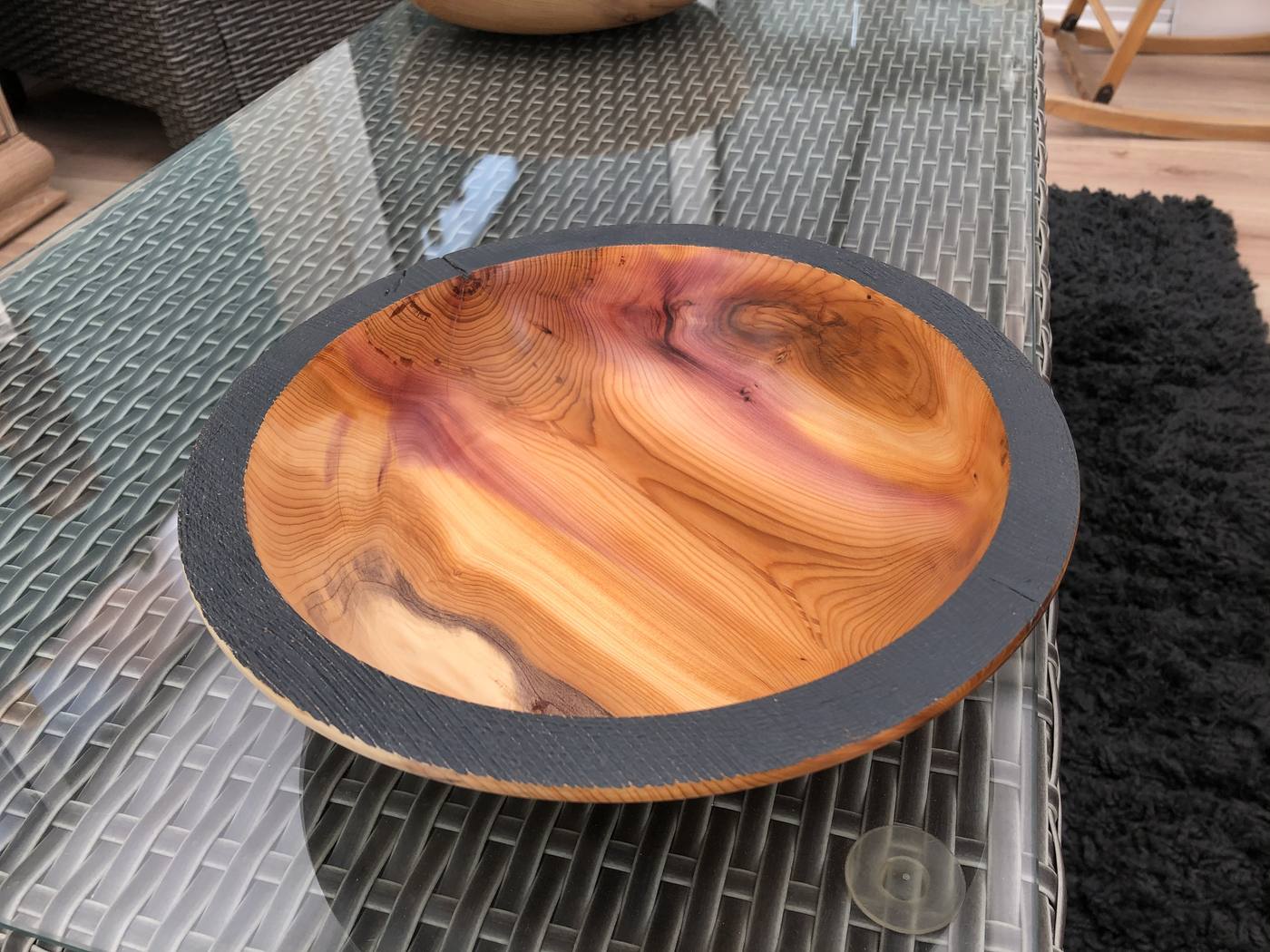 Turned yew bowl with pink heartwood