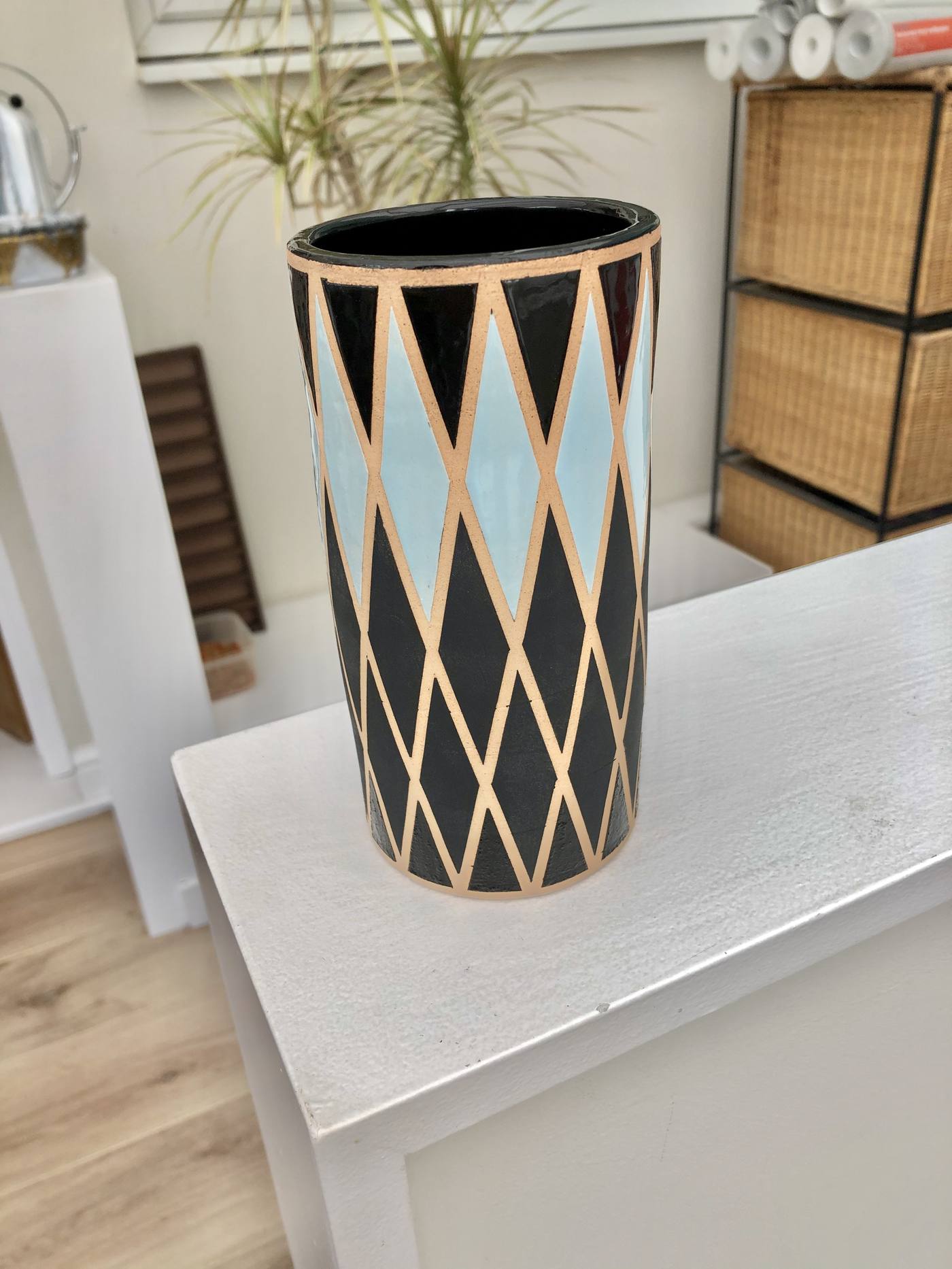 Vase with black and blue diamond pattern